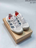 Light gray Adidas Terrex Daroga 25 sneakers shown on a box