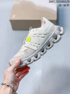 Side profile highlighting the mesh toe, layered side panels, lace details, and segmented sole.