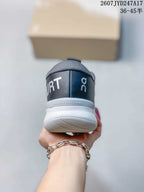 Rear view of the sneaker showing the padded heel, white midsole, and On branding.