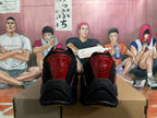 Rear view of black and red Nike Shox sneakers