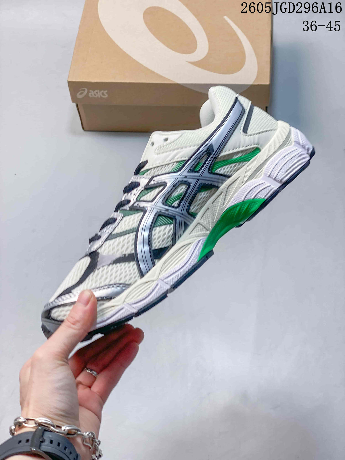 Side view of the ASICS Gel-Cumulus 16 showing mesh-style panels and green accents