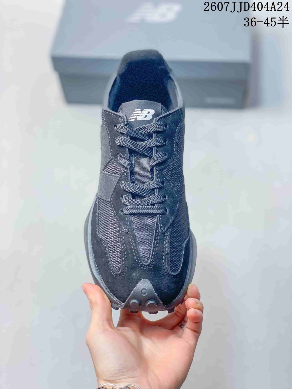 Front view showing the lace-up construction, tongue branding, and layered upper
