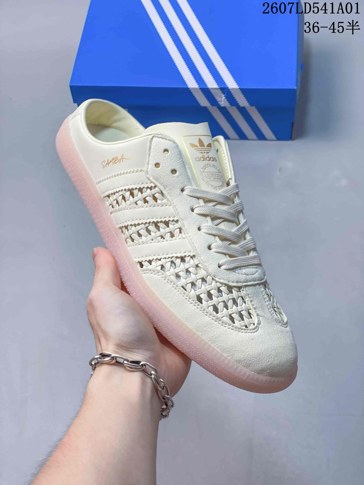 Angled view of the sneaker showing the Samba marking, woven-look panels, and open-back design.