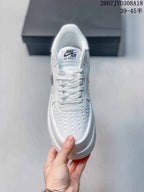 Top view showing the white laces, padded tongue and perforated toe box.
