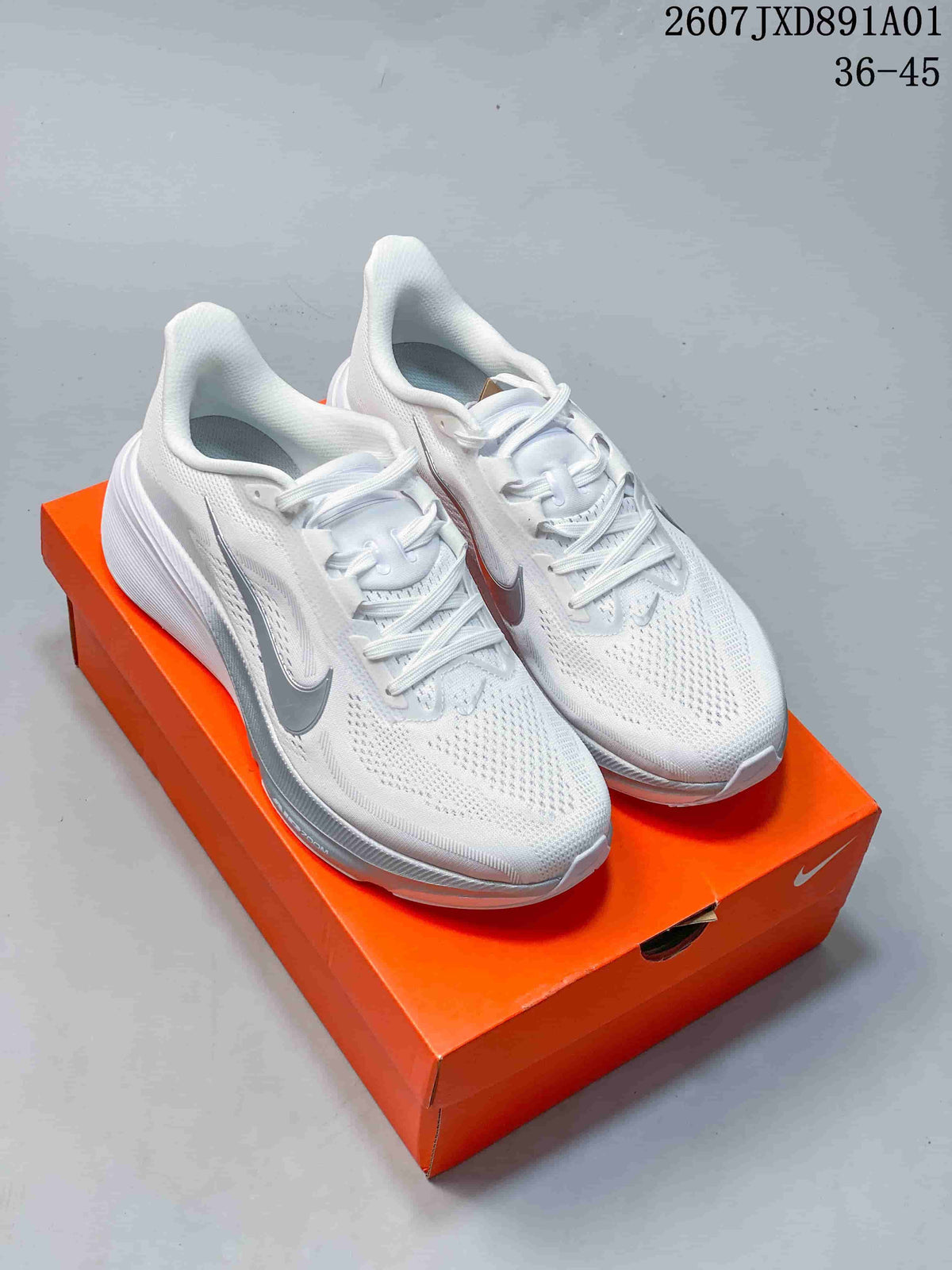 White Nike Air Zoom Pegasus 42 shoes with silver-tone details on an orange shoe box