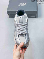 Top view of the New Balance 509 sneaker showing the lace-up design, mesh-style toe box and padded tongue.