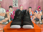Front view of black Nike Hyperdunk basketball shoes with lace-up closure and white outsoles