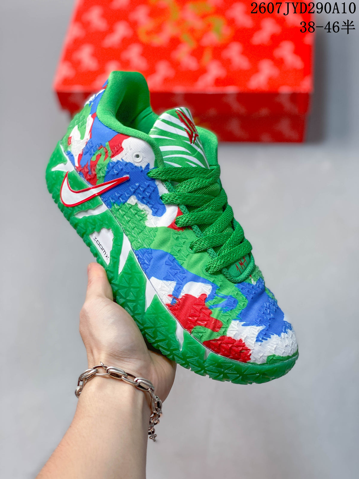 Angled front-side view of the multicolor Nike Ja 3 sneaker with green laces, side Swoosh, and textured green outsole.