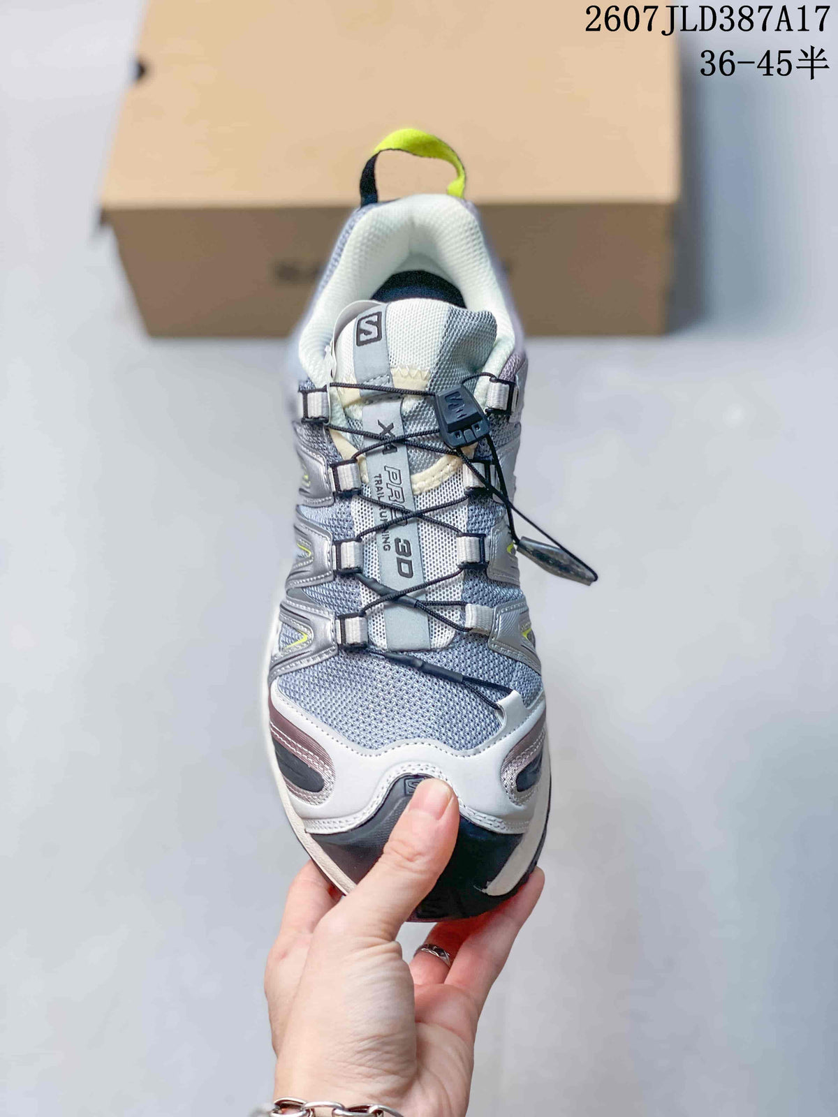 Front view of a Salomon XA PRO 3D shoe showing the mesh toe area, structured overlays and quick-lacing cord.