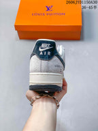 Rear view showing a dark heel panel and light-colored midsole