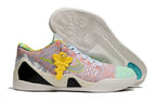 Multicolor low-top shoe with a light outsole and yellow hanging accent.