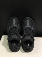 Top view showing the lace-up construction, padded tongues, and branded insoles.