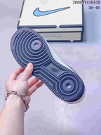Close-up of the dark navy patterned outsole on the Nike Air Force 1 '07 Low