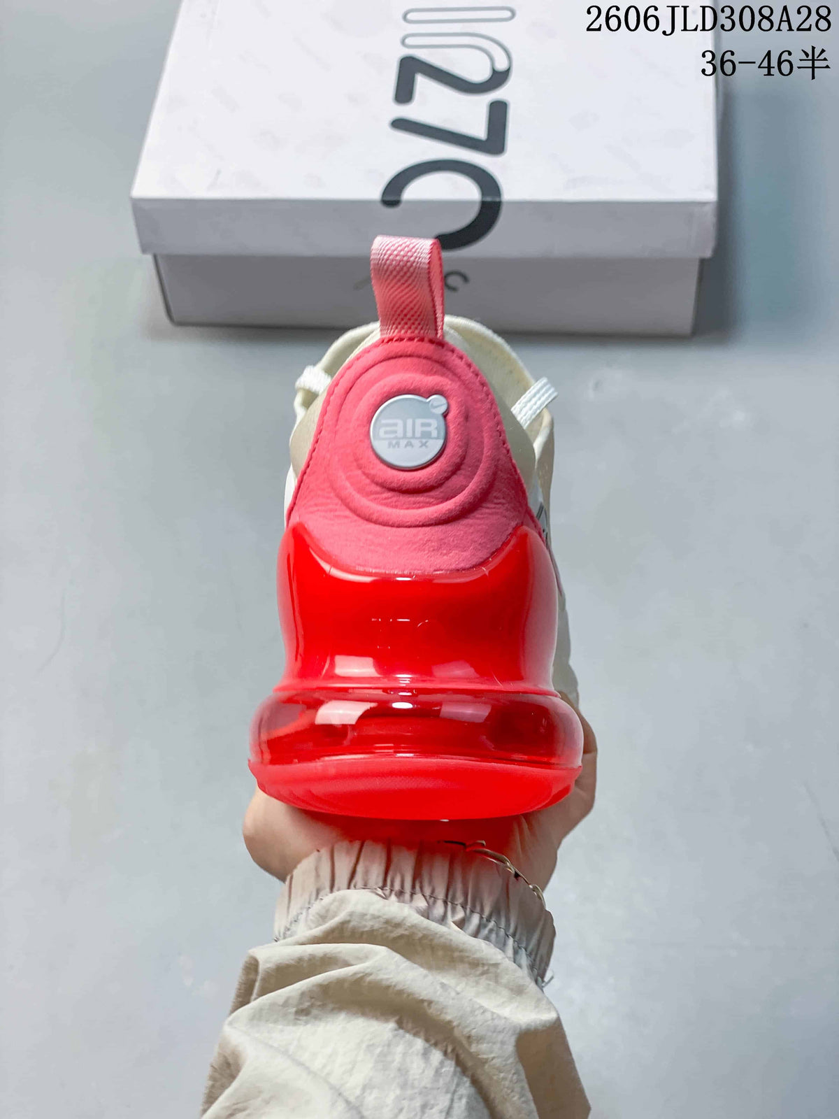 Rear view highlighting the red heel unit of a Nike Air Max 270 Premium sneaker