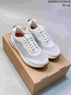 White and pale lavender Loro Piana Week End Walk sneakers with dusty-rose outsole accents, shown from above.