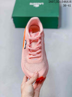 Top view showing the lace-up construction and textured open-knit upper.