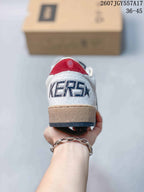 Rear view of the sneaker showing the red heel tab and large branded heel lettering.
