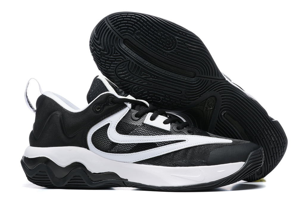 Black and white basketball shoe with a black outsole