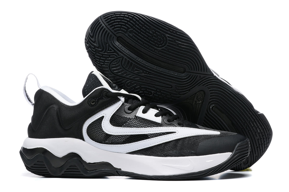 Black and white basketball shoe with a black outsole