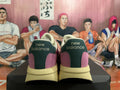Rear view of pink New Balance U370 sneakers with dark heel panels and light-colored soles