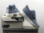 Nike Book 1 Ashen Slate shoe displayed beside its box, showing the side Swoosh and box labels.