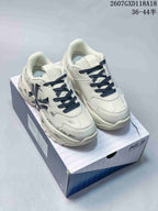 Pair of white and black MLB Big Ball Chunky sneakers displayed on a shoebox, showing dark laces, side graphics, and the style marking 2607GXD118A18.