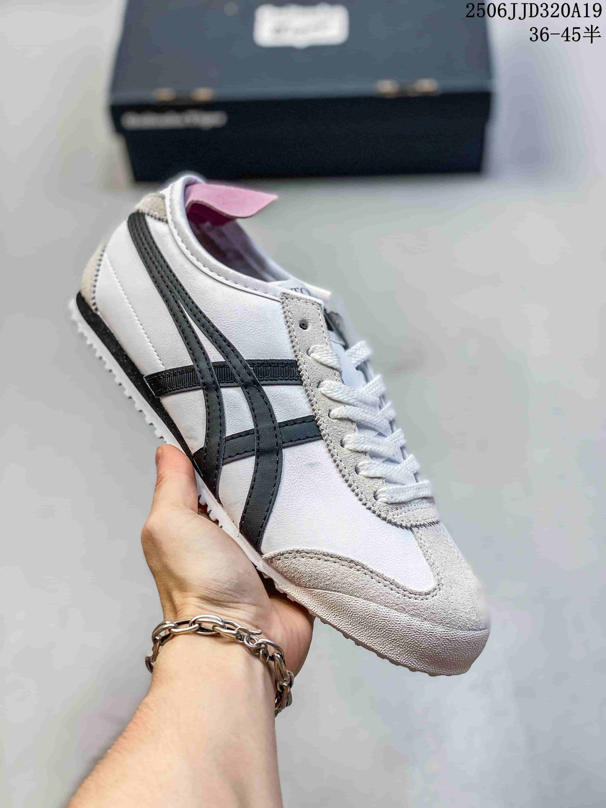White low-top sneaker with black side stripes and light gray overlays