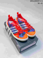Pair of colorful Adidas Terrex CC Boat shoes displayed on an Adidas box, with style code 2604JDD297A15 and size range 36–45 visible.