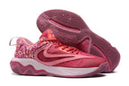 Pink basketball shoe with contrasting pink and cream details