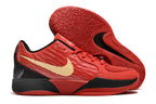 Red, black, and gold Ja 2 shoe side profile with the outsole visible.