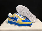 Angled view showing the star-shaped side detail and patterned outsole