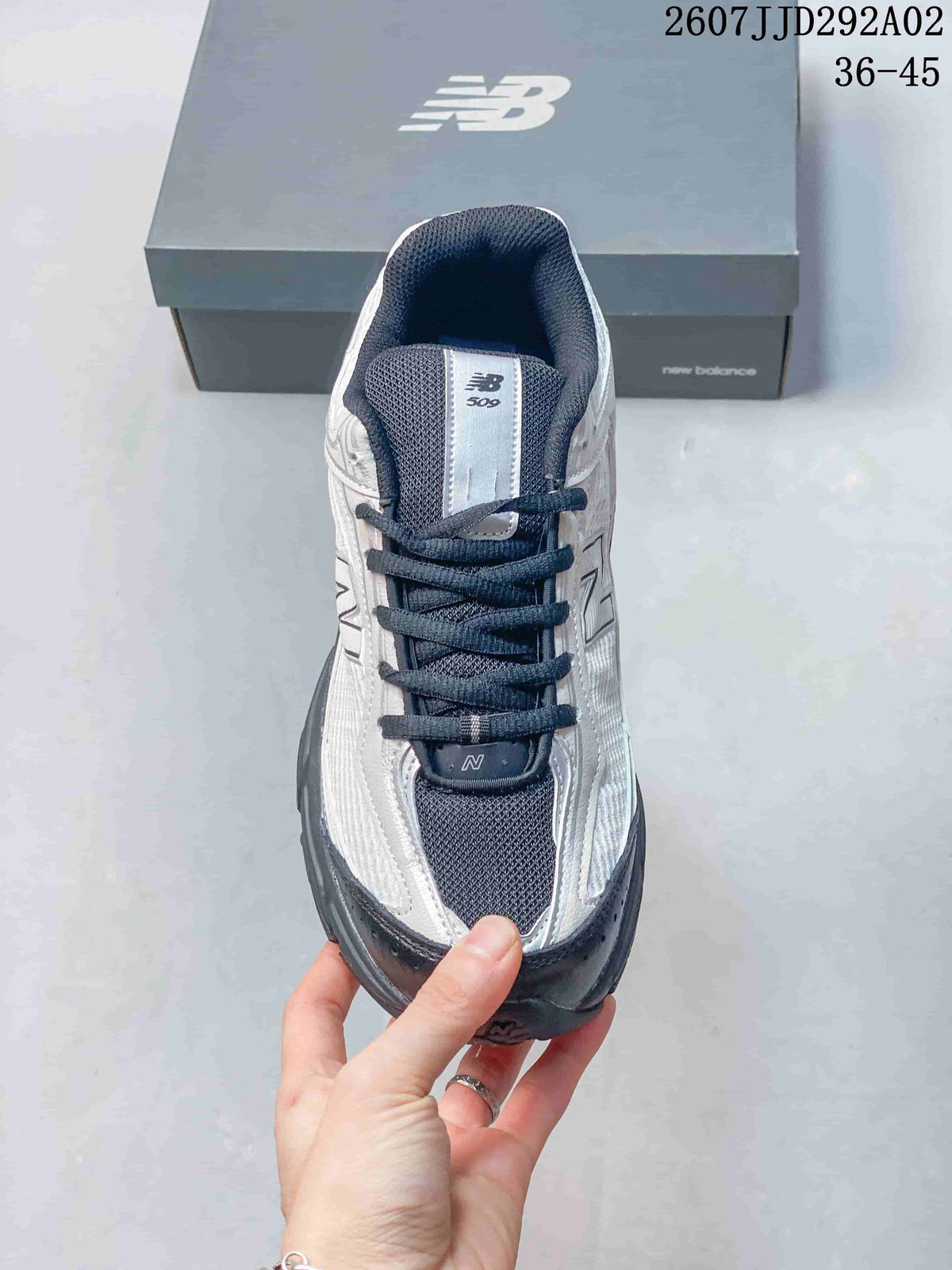 Top view showing the lace-up front, dark tongue and collar, and contrasting toe panel.