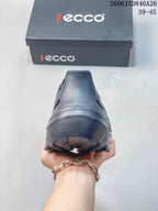 Rear view of a gray clog showing the heel area and molded outsole.