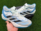 Close view of the Adidas Adizero shoes highlighting the laces, striped sides, and blue accents.