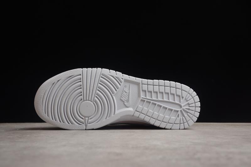 Underside view showing the white rubber outsole and patterned tread.
