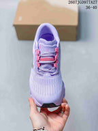 Top view of the lavender and pink sneaker showing the textured toe area, layered laces, and padded collar; image text shows 2607JGD977A27 and 36–40.