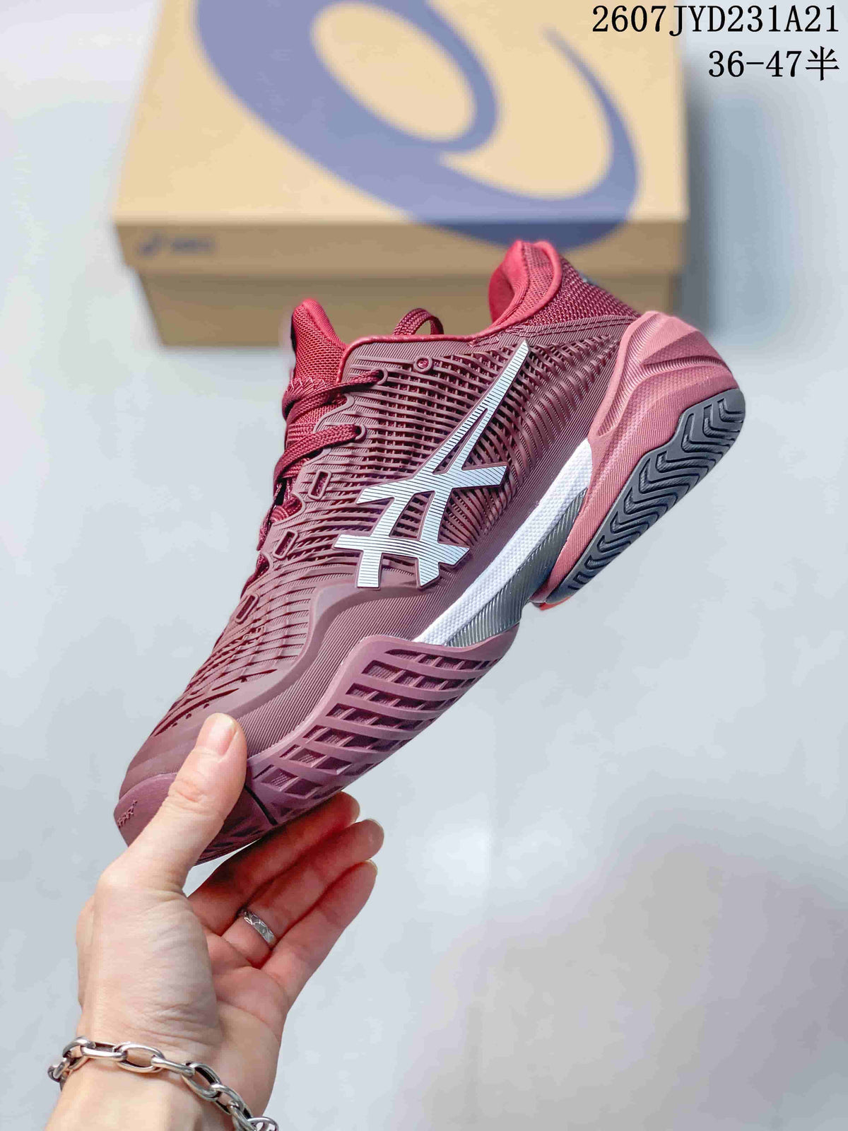 Side and outsole view of the burgundy tennis shoe showing the white ASICS side logo and textured sole pattern.