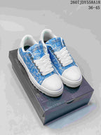Pair of blue NUMERIS low-top sneakers with white toe caps and raised soles displayed on a black shoebox; image text shows style code 2607JDY558A18 and size range 36–45.