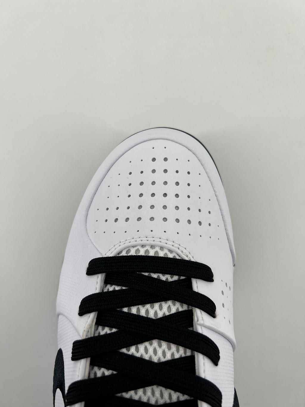 Top view of the perforated toe and lacing