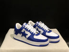Three-quarter product view highlighting the blue and white color blocking, white laces, and side star details.