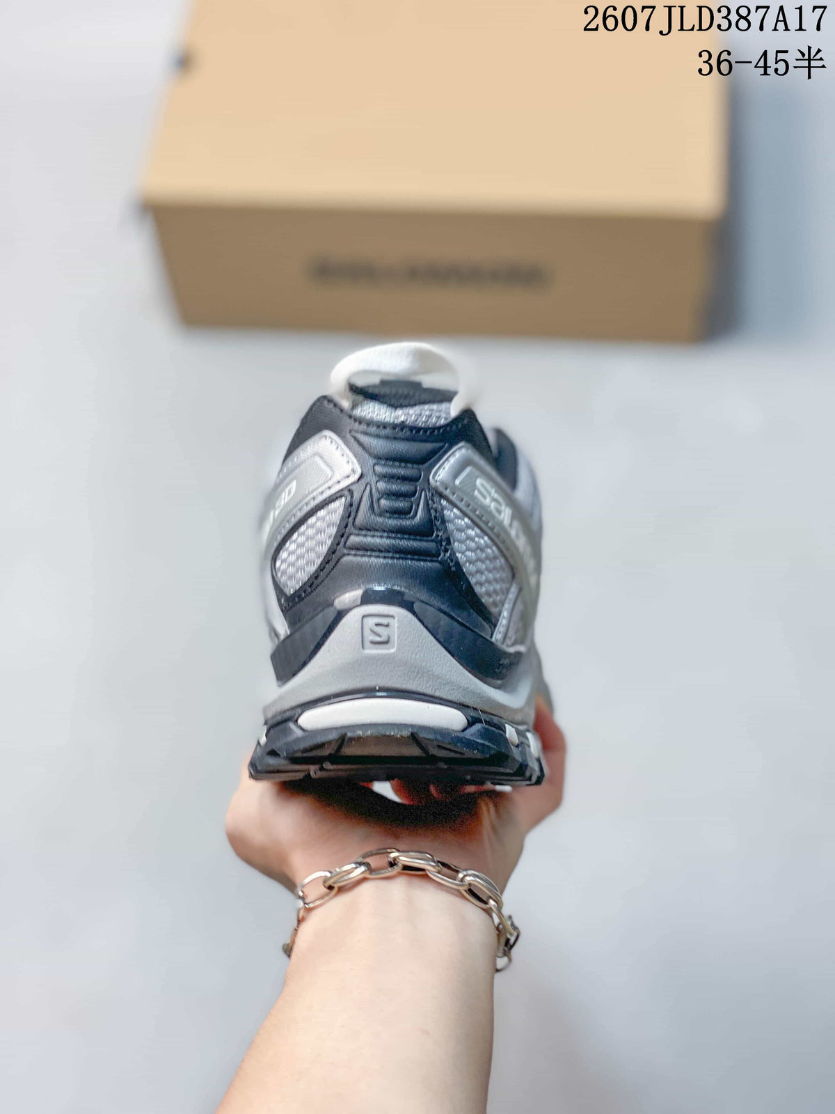 Rear view of a Salomon XA Pro 3D sneaker showing the padded heel, pull tab, layered heel structure, and outsole tread.