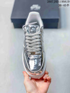 Top view of the metallic silver sneaker showing the perforated toe box, white laces and branded tongue; overlay text shows size range 36–45.