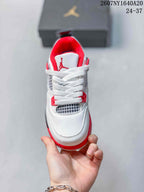 Top view showing white laces, mesh tongue-area panels, red accents, and a red-lined collar.
