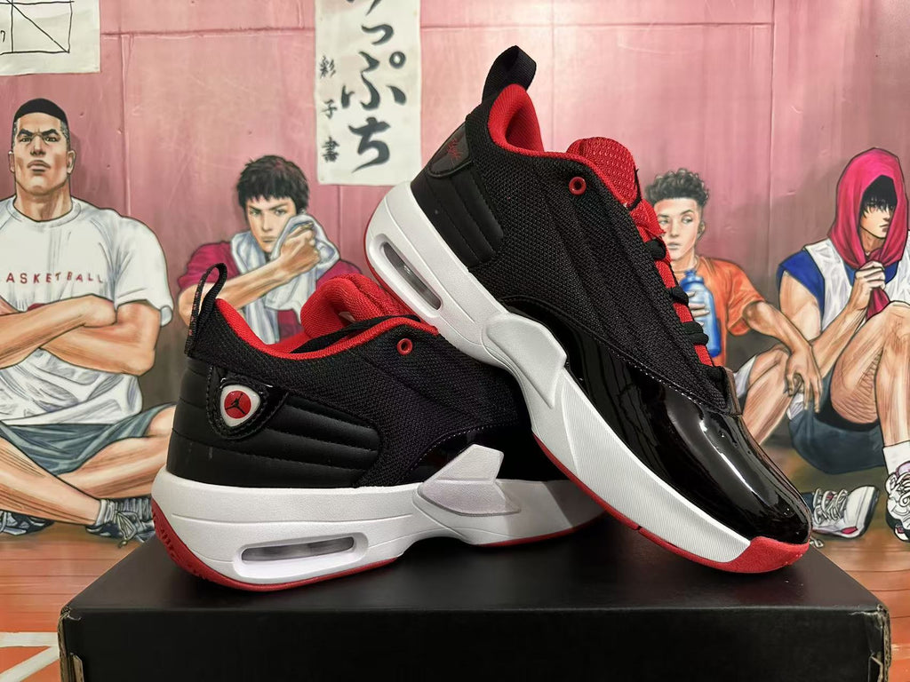 Pair of black and red sneakers shown from the side