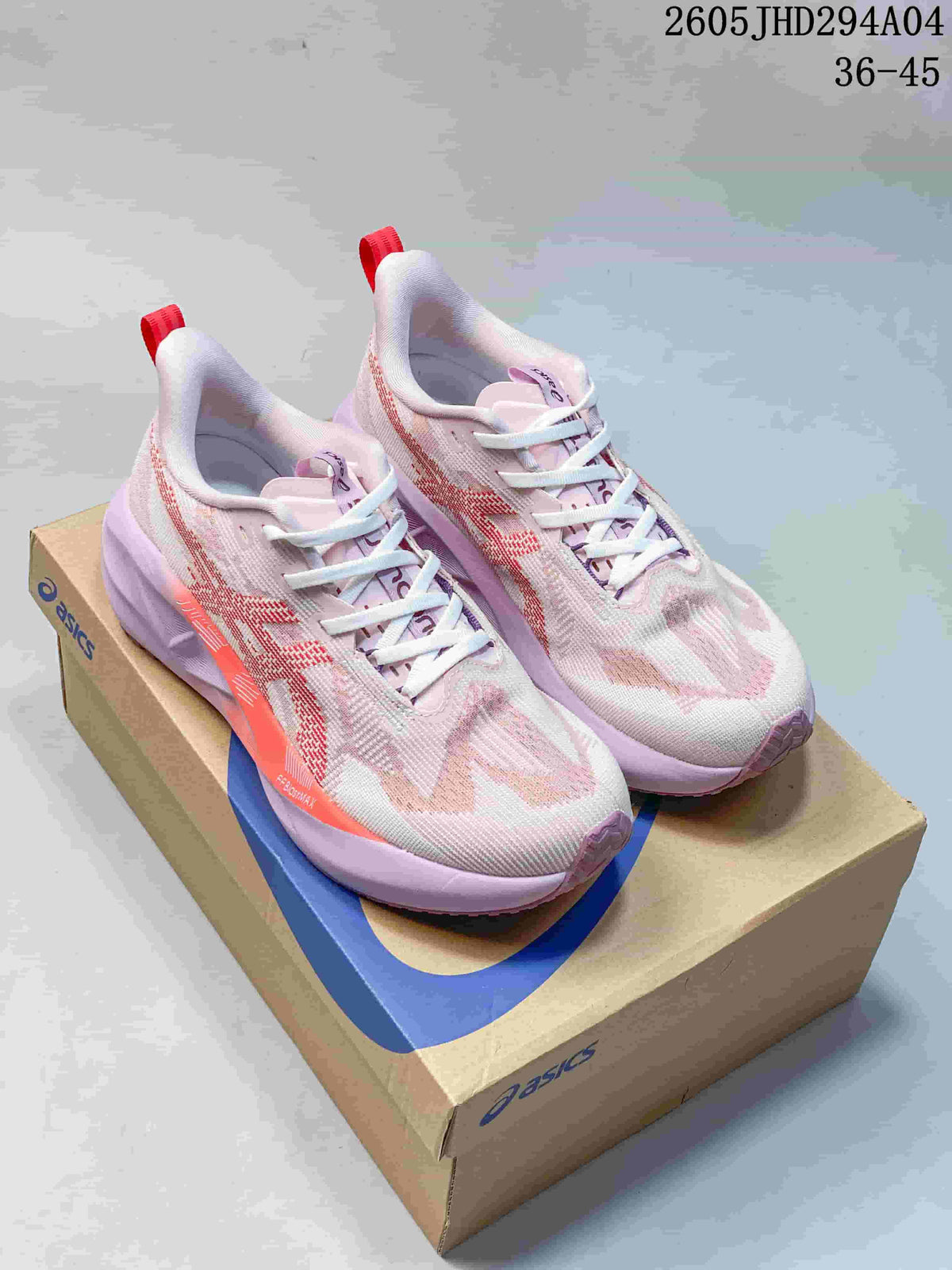 Pair of pale pink, white, and coral ASICS NOVABLAST 5 LE running shoes on a shoebox.