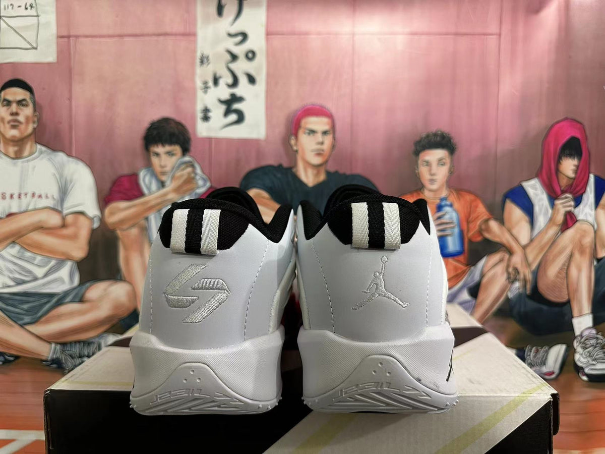 Rear view of the shoes showing contrasting heel logos and black-and-white pull tabs.