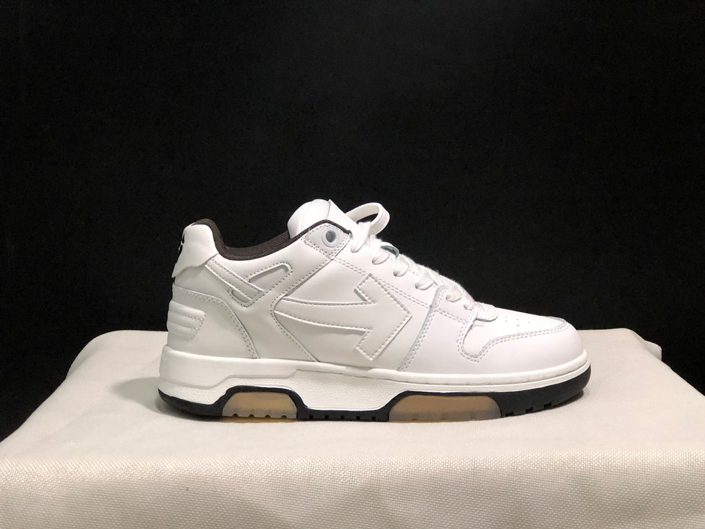 Side profile of a white Out Of Office sneaker showing the layered upper panels and black-and-gum outsole accents.