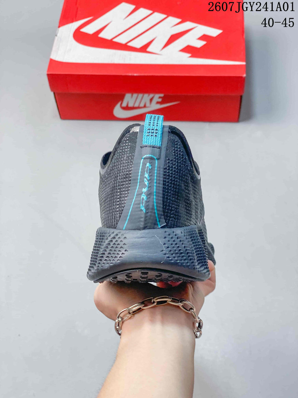 Rear view showing the heel and blue pull tab