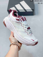 White Adidas Terrex low-top shoe with burgundy accents and a sculpted sole; image also displays the size range 36–45.
