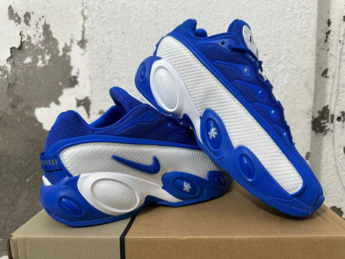 Pair of blue and white Nike sneakers shown from the side